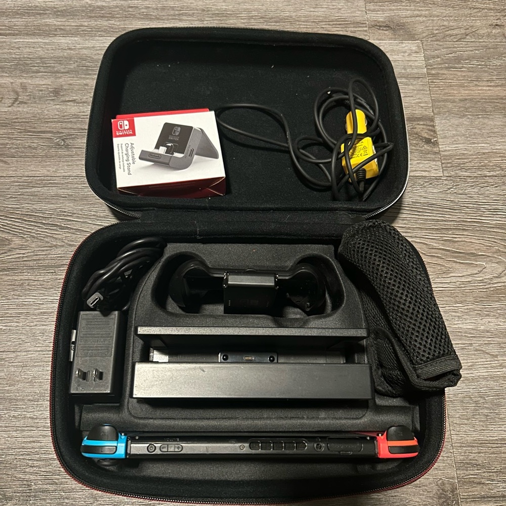 Nintendo Switch Console with Neon Red and Blue Joy-Con